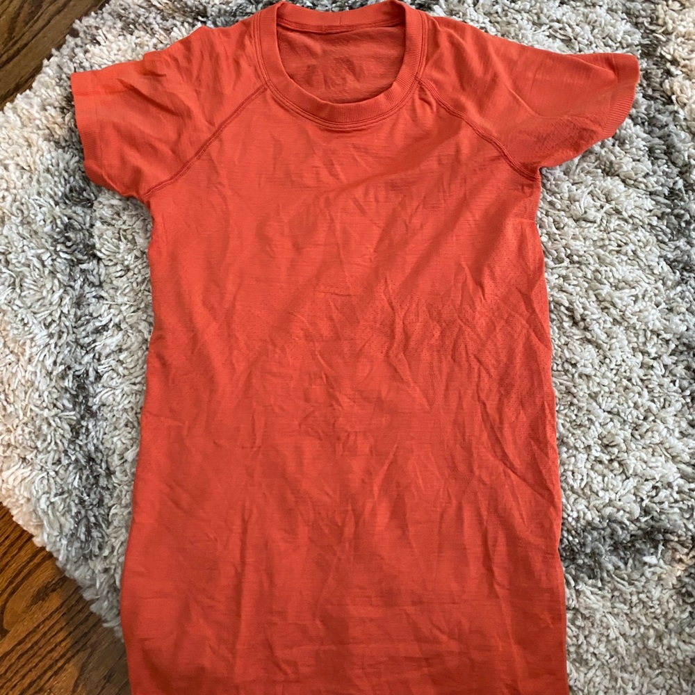 orange swiftly shirt